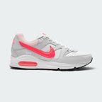 Highlights the lateral profile featuring a bold Hyper Punch Swoosh sweeping over White leather and Light Ash Grey mesh, multi-window visible Max Air unit, and a black-and-white Waffle outsole base.
