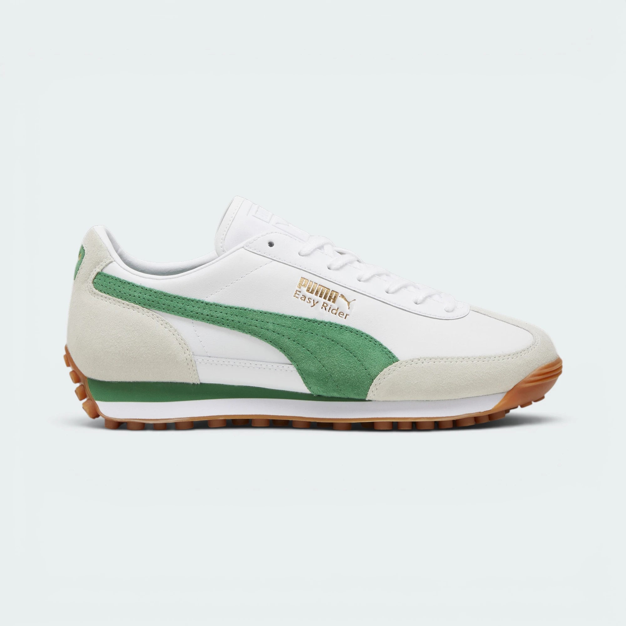 This angle highlights the sleek vintage stride of the shoe, displaying the clean white leather mid-panels, the striking green suede Formstrip, the protective off-white suede toe cap, and the distinctive lugged gum sole wrapping the tip. Main image