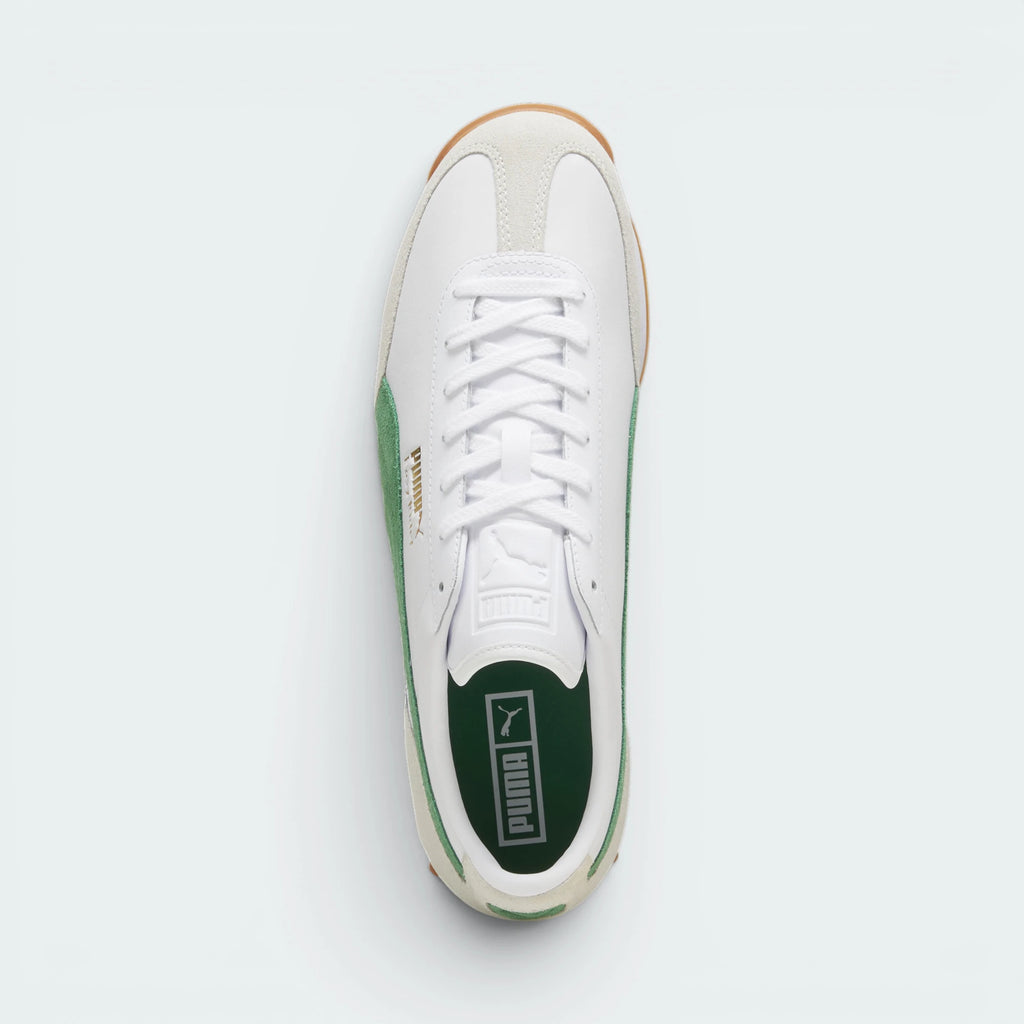 Focuses on the locked-in traditional lacing layout, displaying the perfect symmetry of the white tongue and the clean contour lines framing the low-profile toe box.