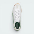 Focuses on the locked-in traditional lacing layout, displaying the perfect symmetry of the white tongue and the clean contour lines framing the low-profile toe box.