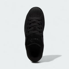 Top-down view of a pair of Puma Creeper Phatty x Fenty Women's trainers in black, highlighting the corduroy texture and lace-up closure.