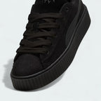Close-up zoom on the front of the Puma Creeper Phatty x Fenty Unisex trainers, showing the corduroy texture, lace-up system, and co-branded tongue.