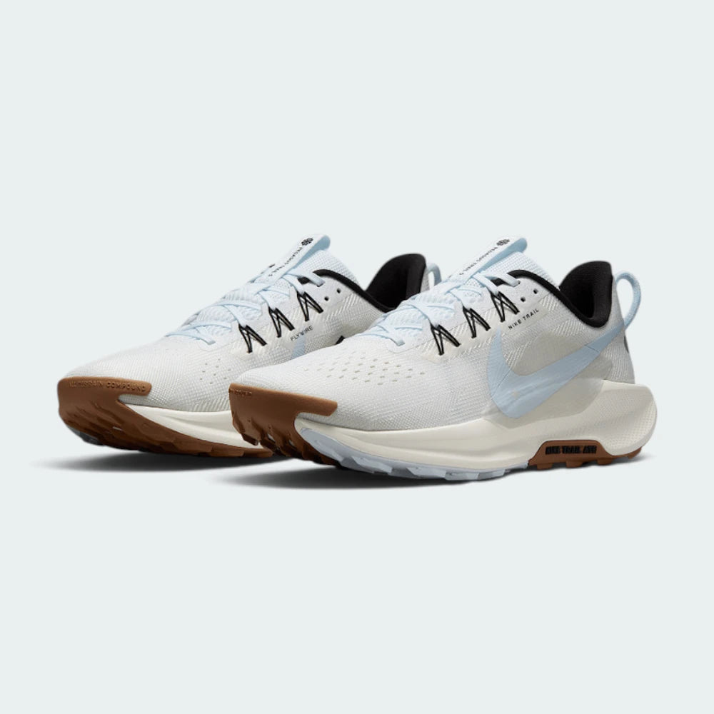 Emphasising the low-cut, athletic stance of the trainers and the clean color harmony of the white uppers sitting cleanly above the ReactX foam midsoles.