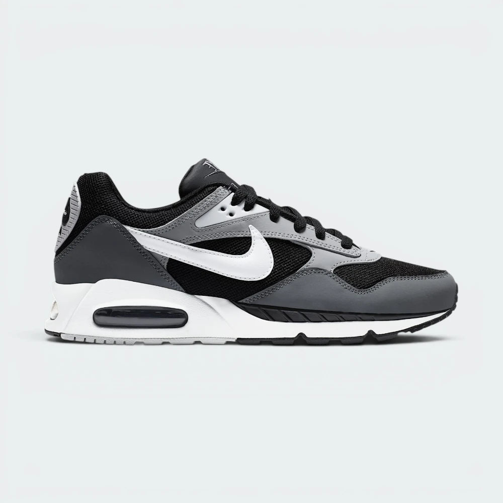 Highlights the high-velocity white Nike Swoosh slashing across the professional depth of the grey panelled upper and the embedded visible Max Air window.