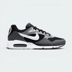 Highlights the high-velocity white Nike Swoosh slashing across the professional depth of the grey panelled upper and the embedded visible Max Air window.