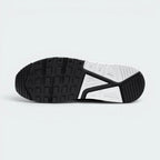 Displays the retro geometric rubber waffle tread pattern engineered for unreal multi-surface everyday grip.