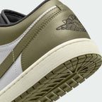 Detailed underside view of Air Jordan 1 Low Medium Olive Men's heel and outsole