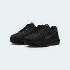 Angled view of two Nike Air Max 2013 Juniors' all-black trainers, side by side, showcasing their iconic design and cushioned profile.