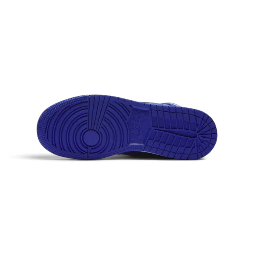 Trade Sports Air Jordan 1 Retro High GS sneaker showing the vibrant Hyper Royal blue rubber outsole with pivot circle.