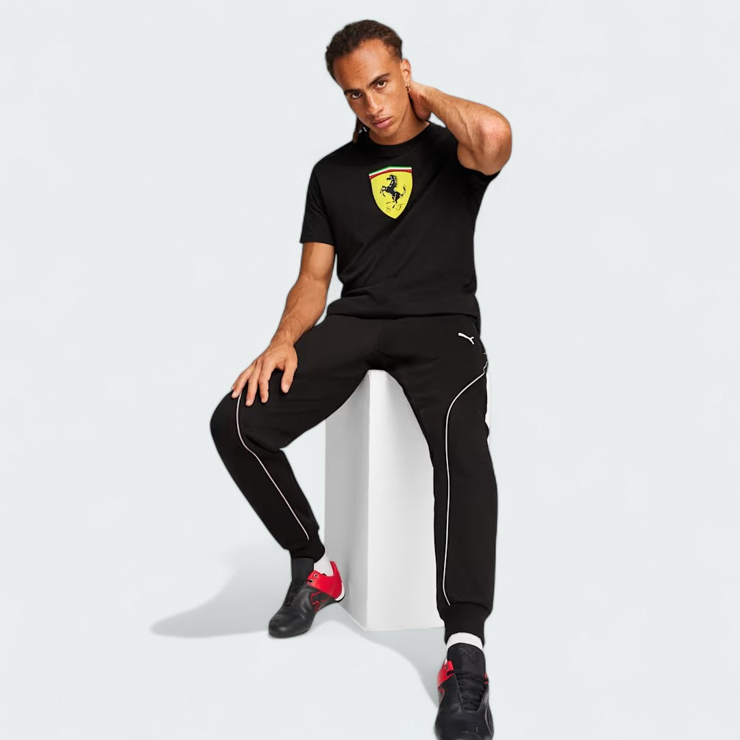 Puma x Ferrari Race Big Shield T-Shirt Men's in black, being worn on model demonstrating the comfort and casual style