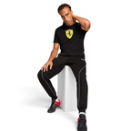Puma x Ferrari Race Big Shield T-Shirt Men's in black, being worn on model demonstrating the comfort and casual style