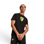 Puma x Ferrari Race Big Shield T-Shirt Men's in black, front view shown on a model showing a classic crew neck and a large, bold Ferrari Scudetto badge on the chest.