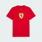 Alt Text: Puma x Ferrari Race Big Shield T-Shirt Men's in red, laydown front view showing a classic crew neck and a large, bold Ferrari Scudetto badge on the chest.