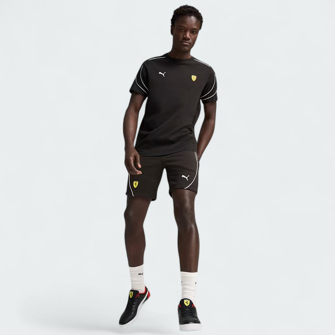 Puma x Ferrari Race Shorts Men's in black, front view showing model in a pose showing comfort and style