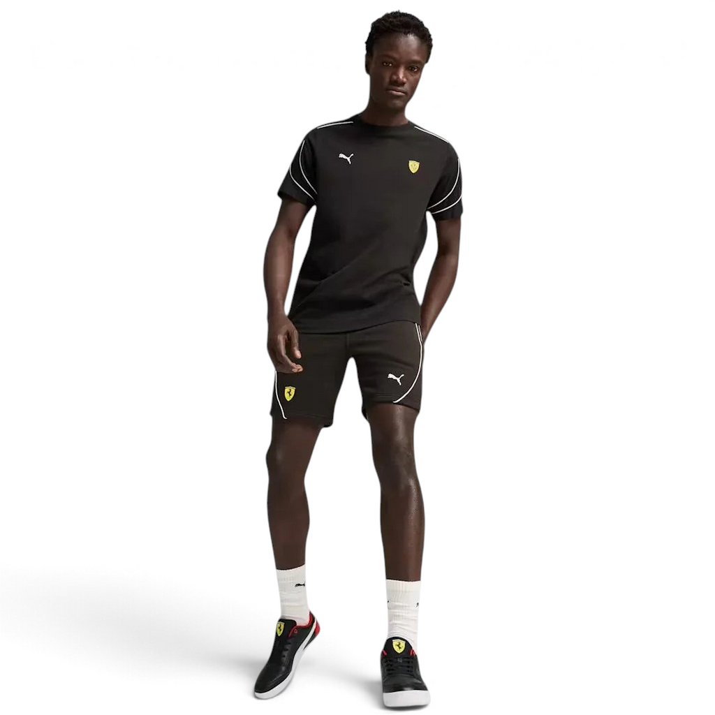 Puma x Ferrari Race Shorts Men's in black, front view showing model in a pose showing comfort and style