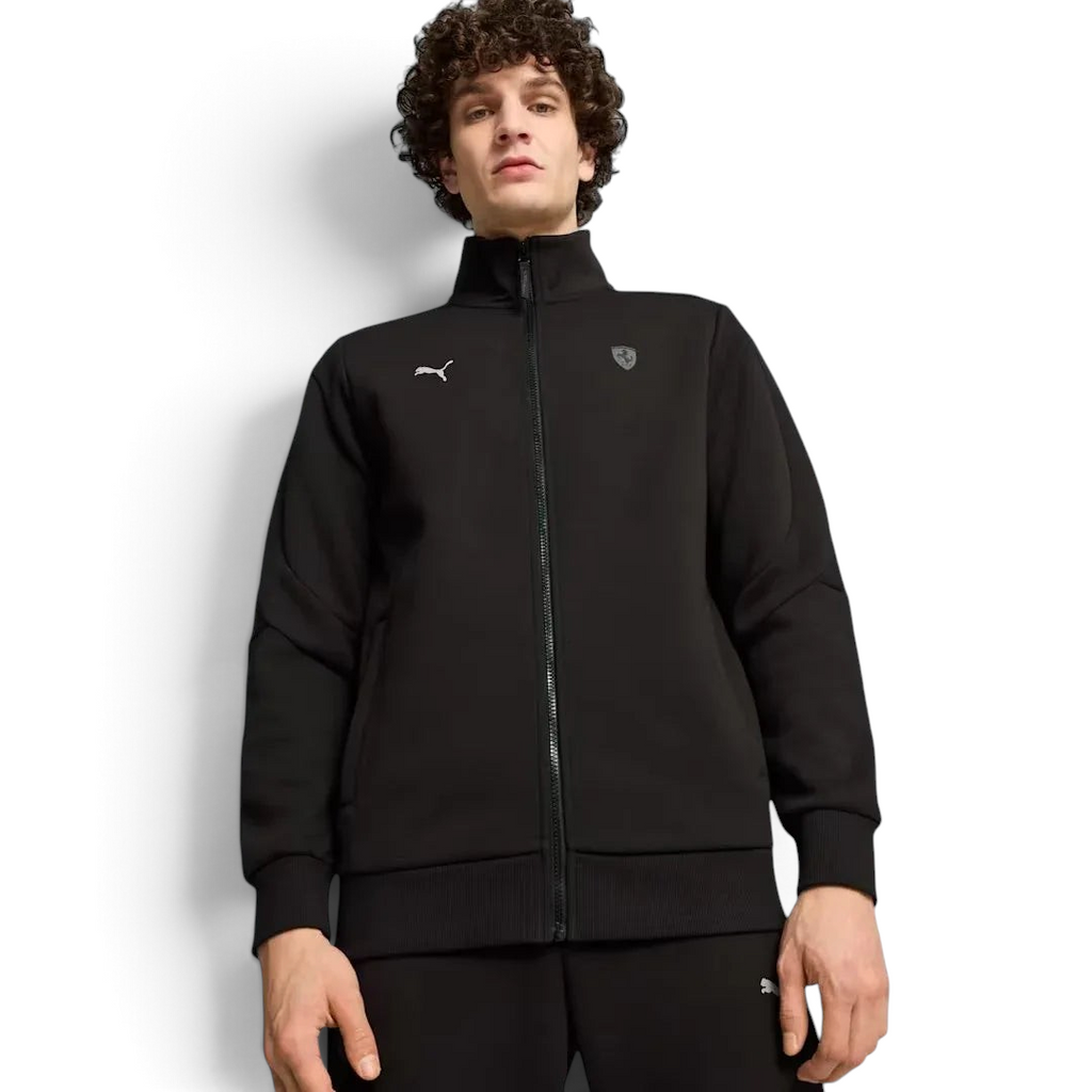 Puma x Ferrari Style MT7 Jacket Men's in black, worn by a model front view showing full-zip closure, stand-up collar, and embroidered Ferrari and Puma logos.