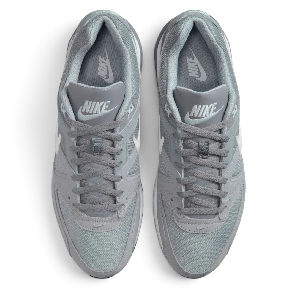 Focuses on the locked-in traditional lacing layout, displaying the perfect symmetry of the wolf grey mesh tongue, matching laces, and the airy open mesh guarding the front toe box area.