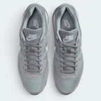 Focuses on the locked-in traditional lacing layout, displaying the perfect symmetry of the wolf grey mesh tongue, matching laces, and the airy open mesh guarding the front toe box area.