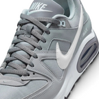 Details the premium precision of the stitched overlays wrapping the front toe cap to defend against debris, showcasing the breathable mesh ventilation pores up close.