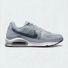 Nike Air Max Command Men's trainers in grey with blue and black accents, side profile showing mesh and synthetic upper, visible Max Air unit in heel, and classic Swoosh.