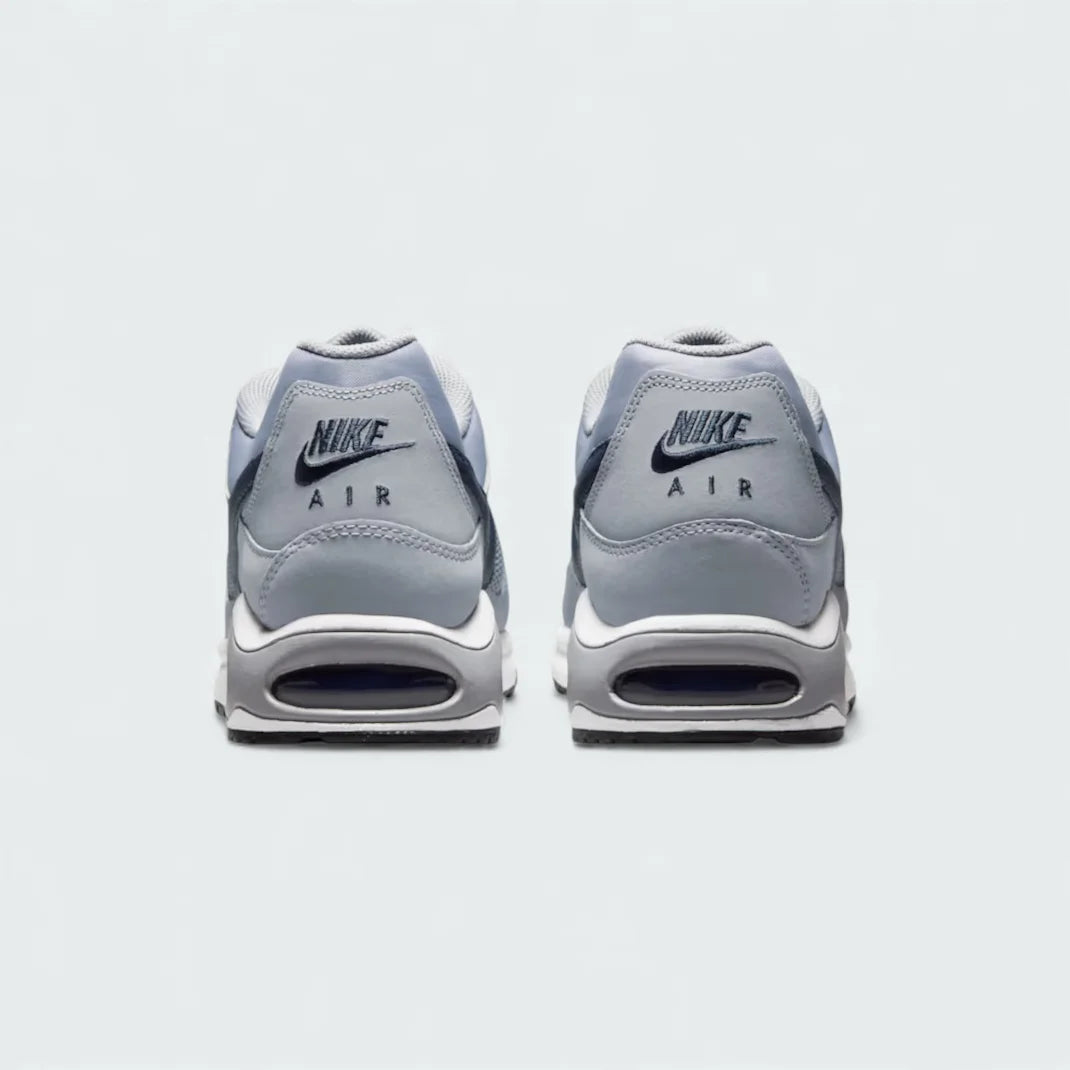 Rear view of the Nike Air Max Command Men's grey trainers, focusing on the visible Max Air unit in the heel and padded collar.