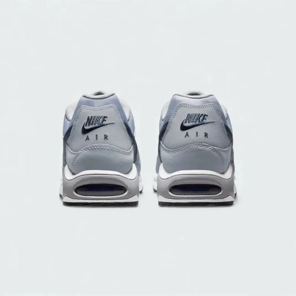 Rear view of the Nike Air Max Command Men's grey trainers, focusing on the visible Max Air unit in the heel and padded collar.