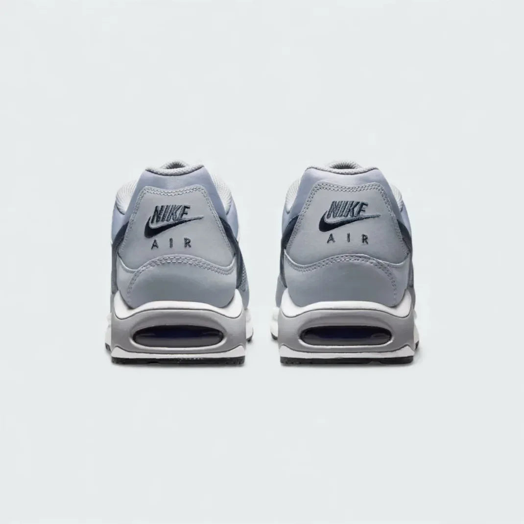 Rear view of the Nike Air Max Command Men's grey trainers, focusing on the visible Max Air unit in the heel and padded collar.