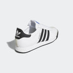 Back view of adidas Samoa Men's sneakers showing black heel tab with adidas Trefoil logo