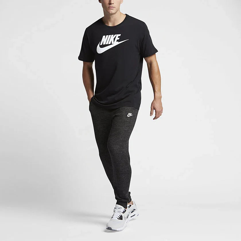Nike Men's Futura Icon Tee Shirt in black, front view showing the prominent white Nike Futura logo on the chest.
