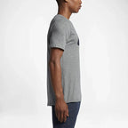 Nike Men's Futura Icon Tee Shirt in grey, side profile showing short sleeves, classic fit, and the overall silhouette.