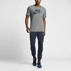 Nike Men's Futura Icon Tee Shirt in grey, front view showing the prominent white Nike Futura logo on the chest