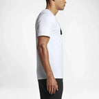 Nike Men's Futura Icon Tee Shirt in white, side profile showing short sleeves, classic fit, and the overall silhouette.