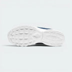 Displays the classic textured geometric grid pattern of the synthetic waffle grip sole, engineered for unreal everyday multi-surface traction.