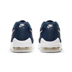 Focuses on the contoured shape of the structured rear heel counter, highlighting the crisp white Nike Air block logo stamped cleanly onto the spine.