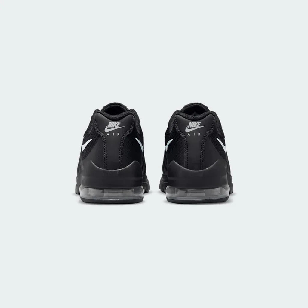 Nike Air Max Invigor Juniors Trainers Black 749572-003 back view showing heel loop and Air branding