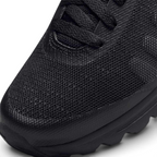 Close-up of Nike Air Max Invigor Juniors Trainers Black 749572-003 laces, tongue logo, and mesh texture