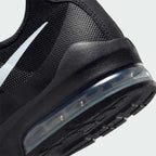 Rear underside close-up of Nike Air Max Invigor Juniors Trainers Black 749572-003 heel and visible Air unit