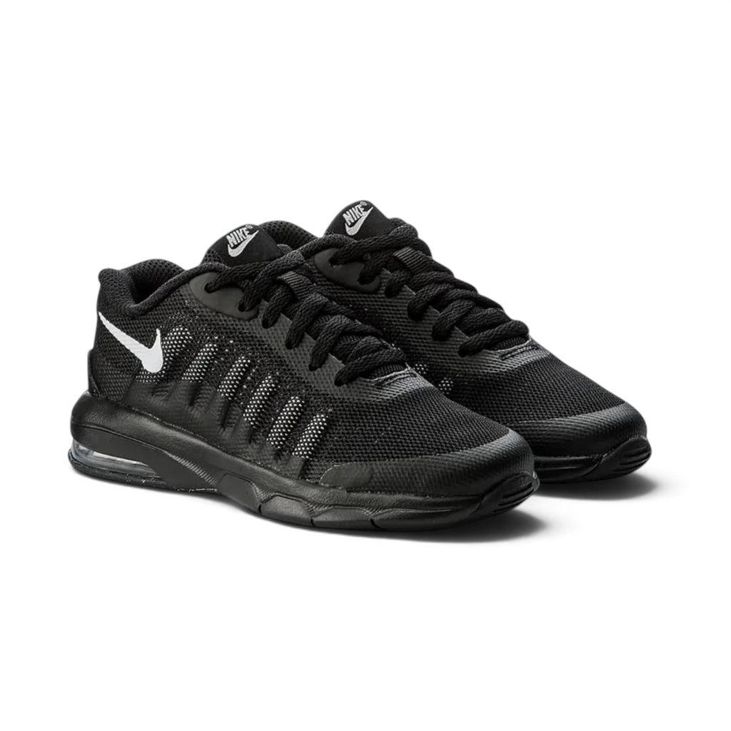 Black athletic shoes with Nike logo on a light gray background