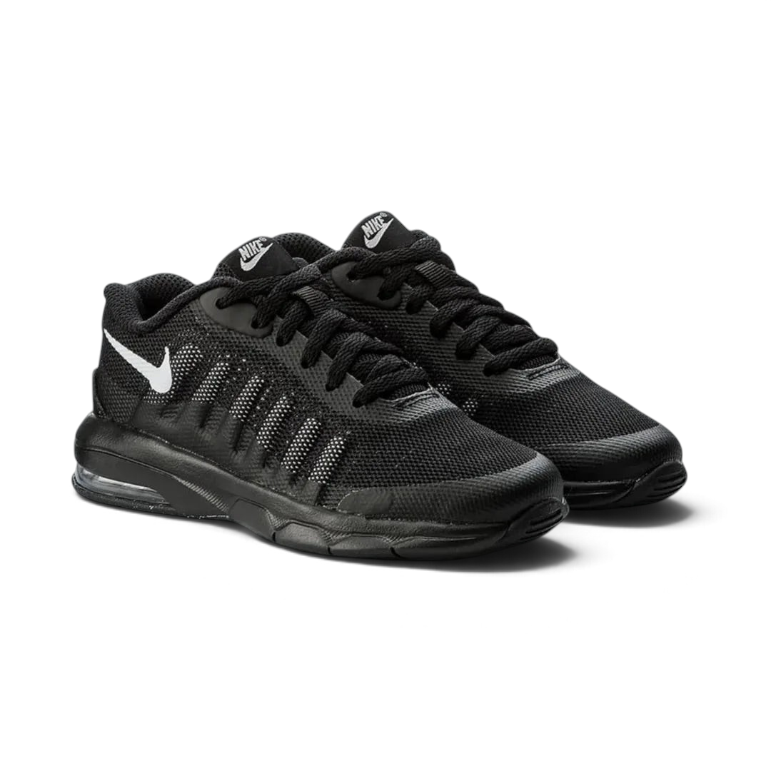 Black athletic shoes with Nike logo on a light gray background