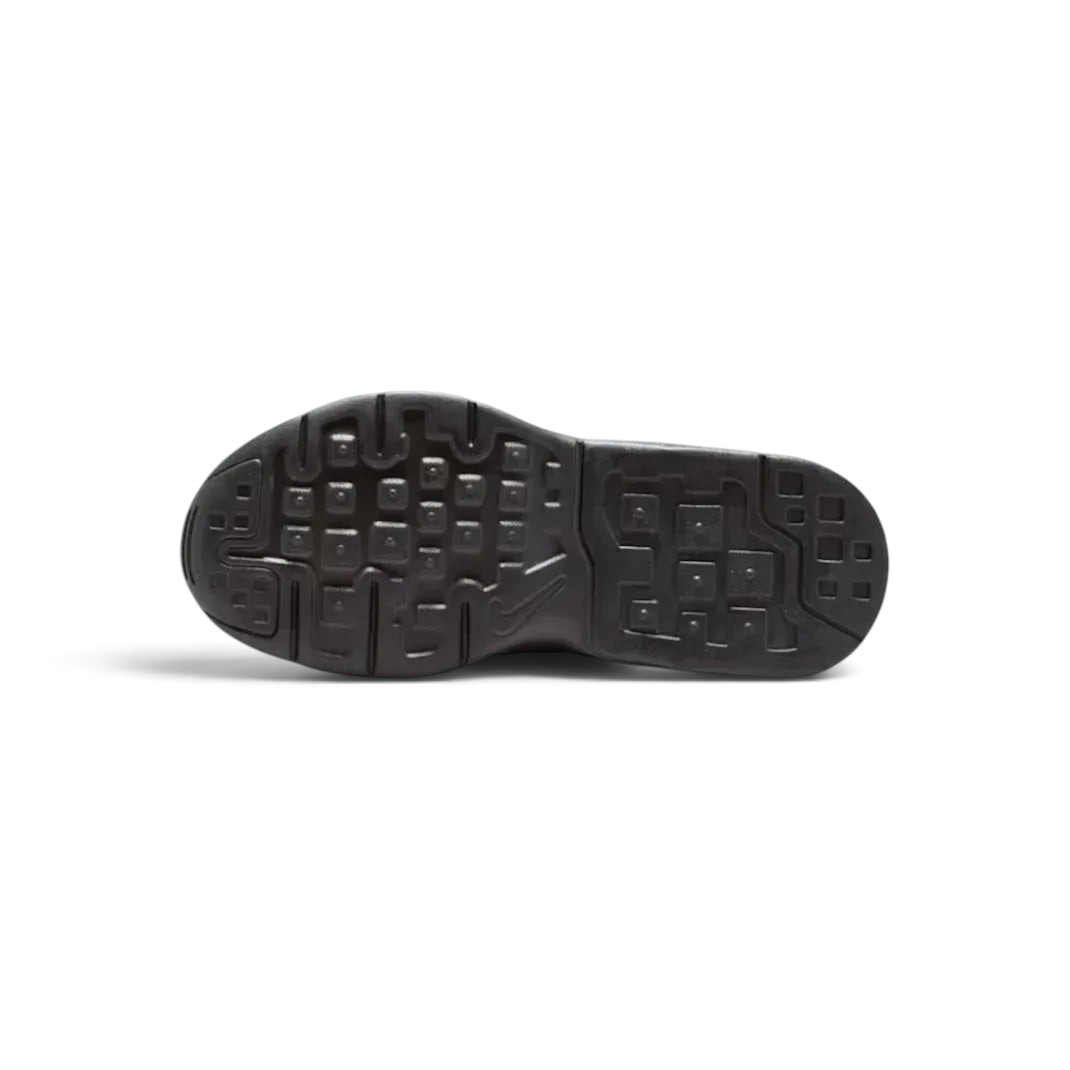 View of the black rubber outsole, showcasing the modified waffle traction pattern for multi-surface grip.