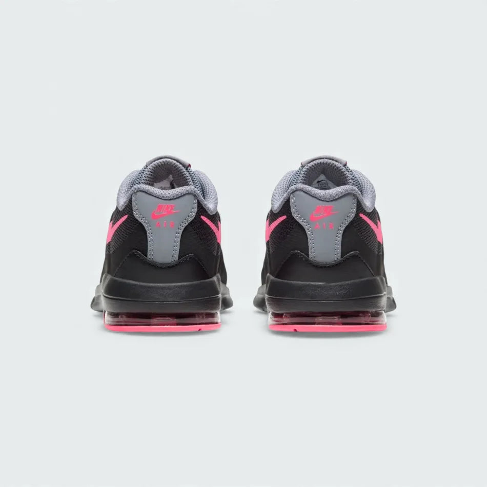 Rear view of the Nike Air Max Invigor Children's black trainers, focusing on the visible Max Air unit in the heel and subtle branding.