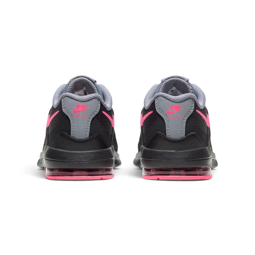 Rear view of the sneakers emphasizing the heel panels, embroidered Nike branding, and the textured sole wrap.