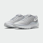 Angled view of two Nike Air Max Invigor Men's grey trainers, side by side, showcasing their modern aesthetic and lightweight construction.