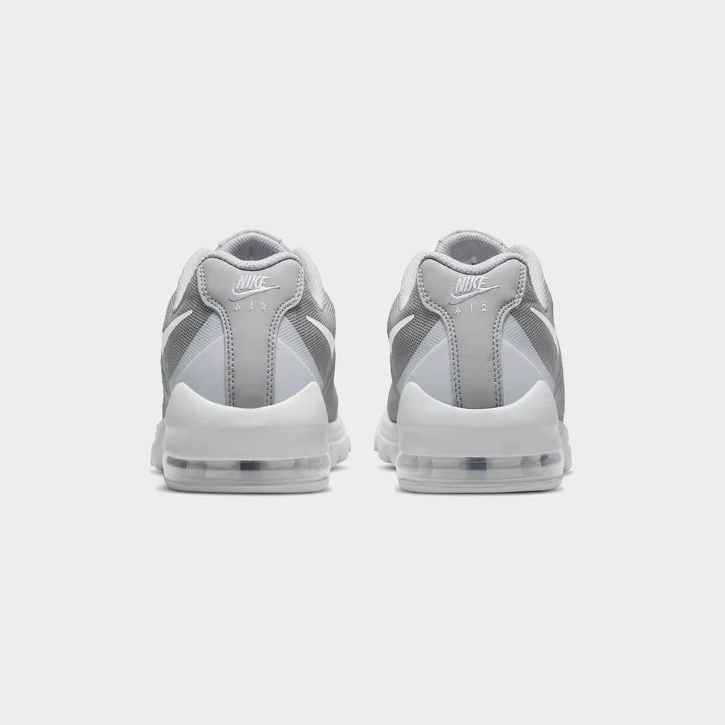 Rear view of the Nike Air Max Invigor Men's grey trainers, focusing on the visible Max Air unit in the heel and subtle branding.