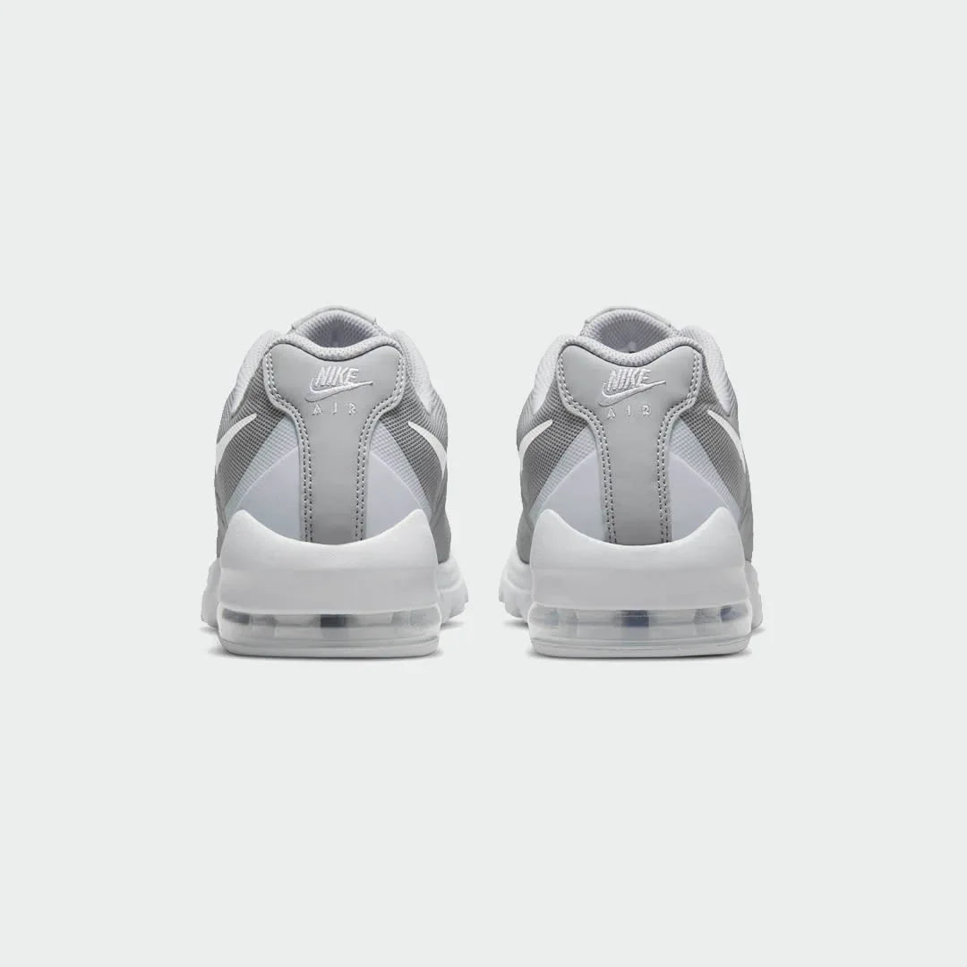Rear view of the Nike Air Max Invigor Men's grey trainers, focusing on the visible Max Air unit in the heel and subtle branding.