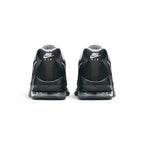 Showing the structured rear heel counter construction, detailing the visible external soft heel puffs, Achilles cushion padding, subtle Nike branding, and rounded 10mm-drop foam heel bevel.