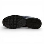 Bottom profile of the shoe displaying the black rubber waffle outsole tread pattern designed for reliable multi-surface traction.