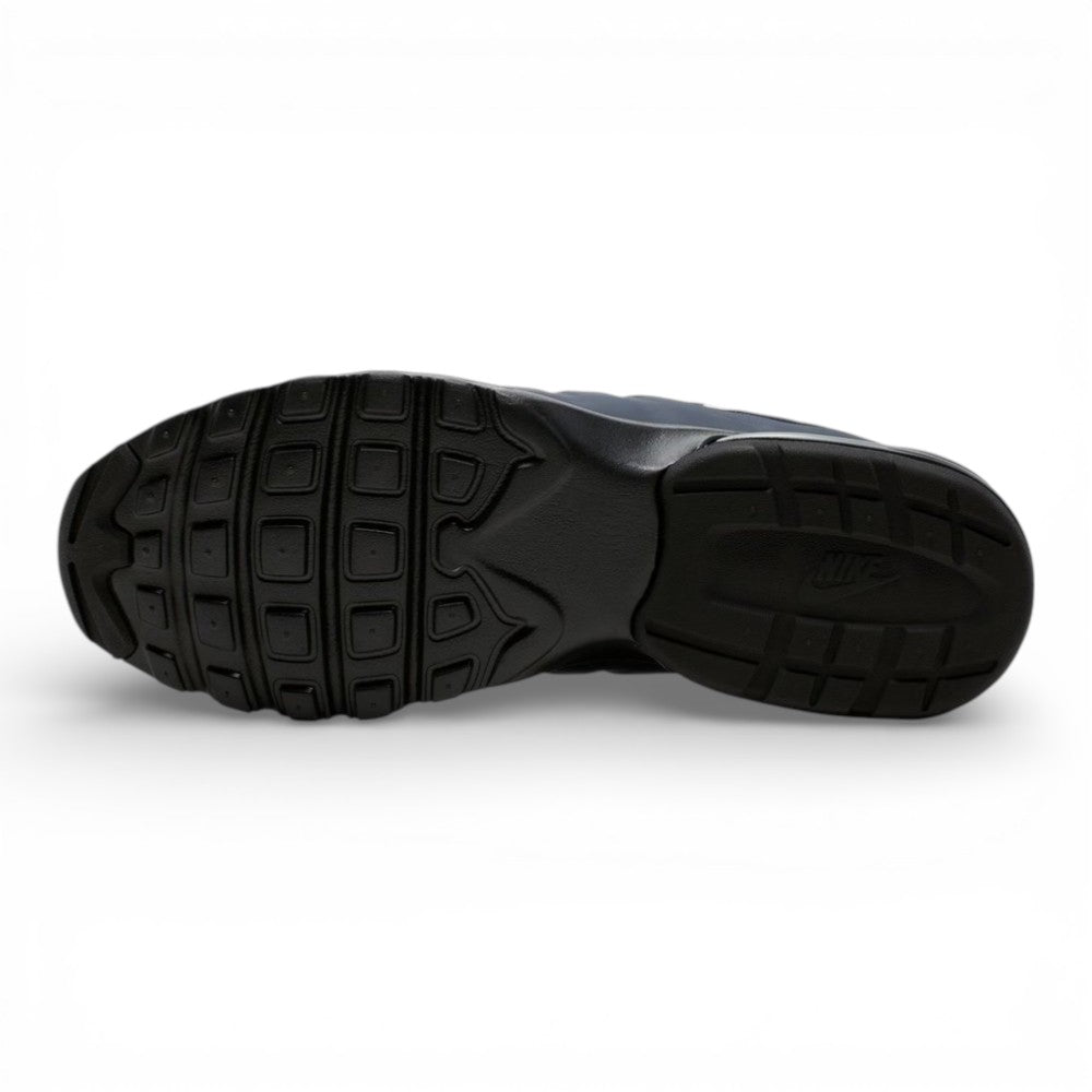 Bottom profile of the shoe displaying the black rubber waffle outsole tread pattern designed for reliable multi-surface traction.