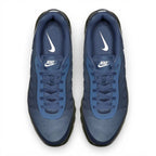 Overhead view of both sneakers showing the Breathe Tech mesh forefeet, central lacing systems, and navy blue insoles printed with white Nike branding.