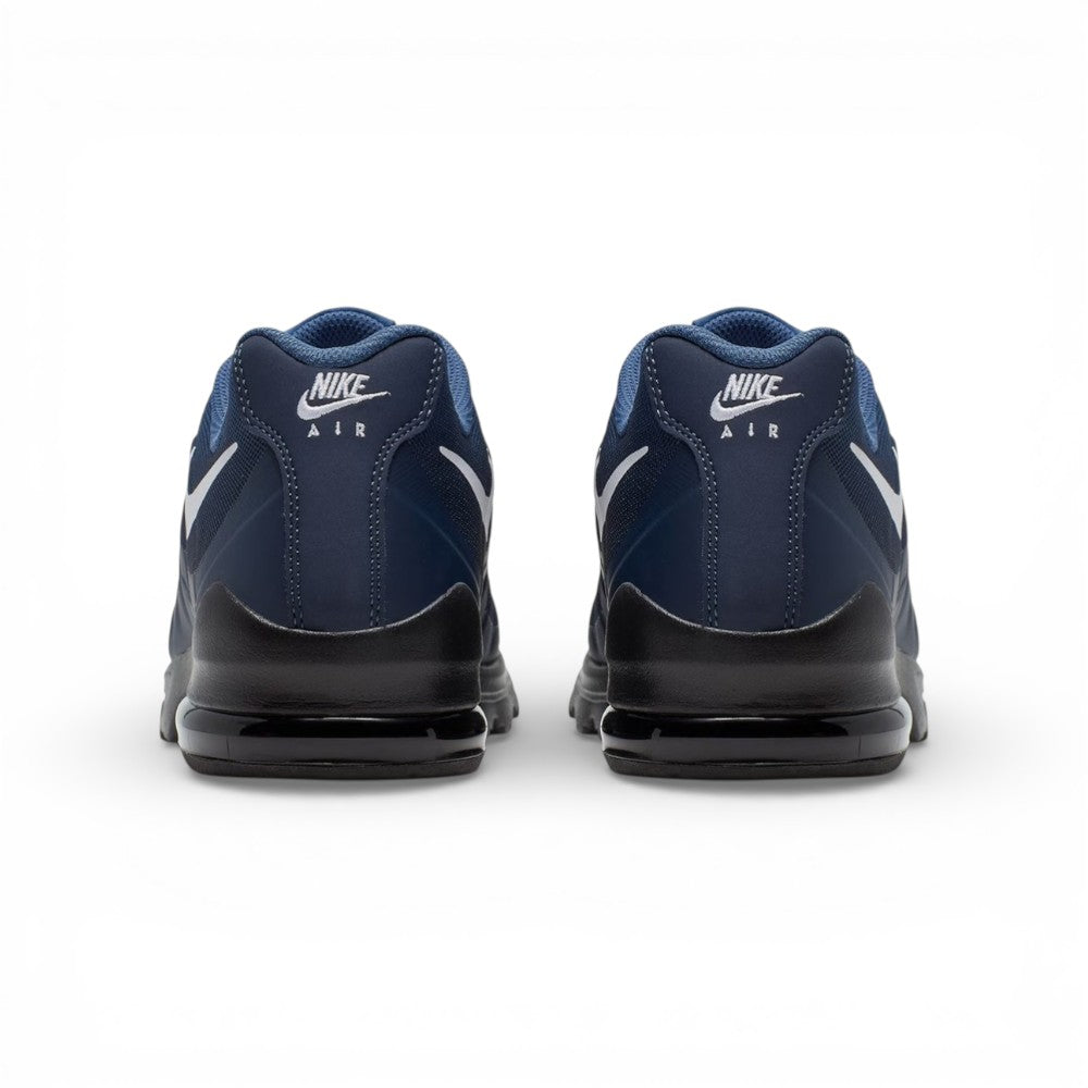 Rear view of the sneakers emphasizing the black heel counters, embroidered Nike Air branding, and visible Max Air windows.